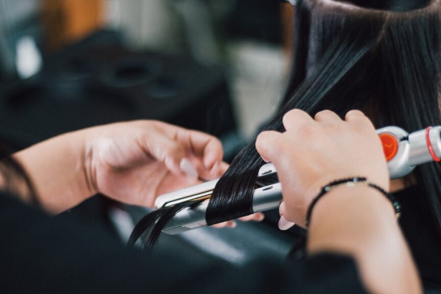 Photo by Giselle Lazcano person holding black and silver hand tool